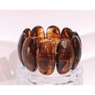 Oval resin stretch - Amber