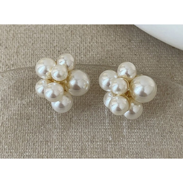 Multiple faux pearls, studs...