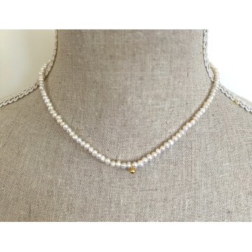Tiny 3x2mm pearls with gold...