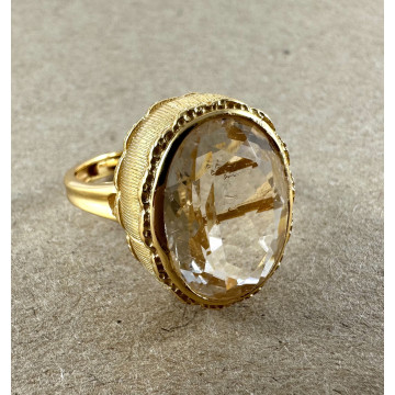 Bezel set faceted clear...