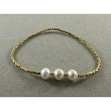 Fine gold bead stretch with...