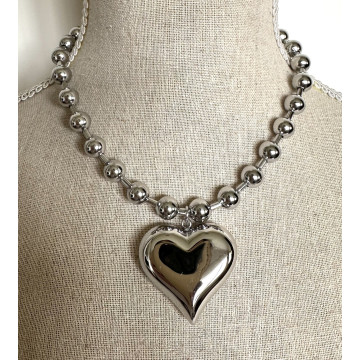 Silver balls with heart...