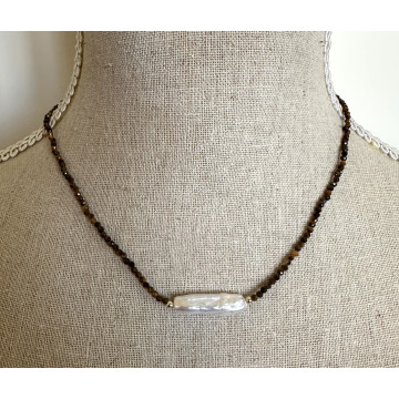 Faceted stone with single...