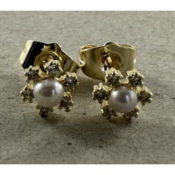Tiny cz flower studs with...