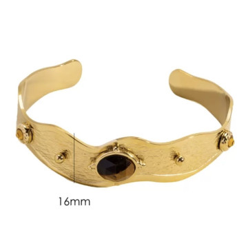 Curved edge cuff with stone...