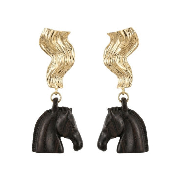 Wooden horse head on gold...